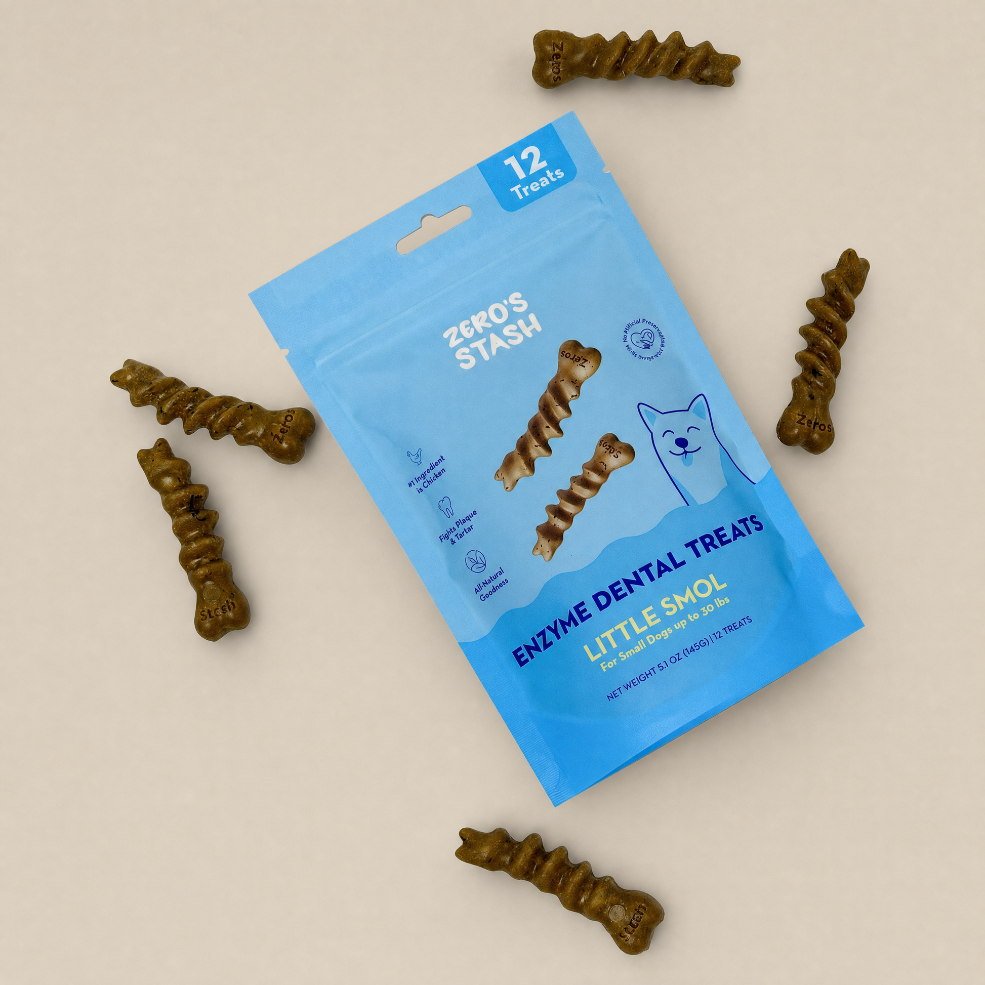 A blue bag of Zero's Stash Enzyme Dental Treats for Small Dogs, surrounded by several brown spiral-shaped dental treats on a light beige background.